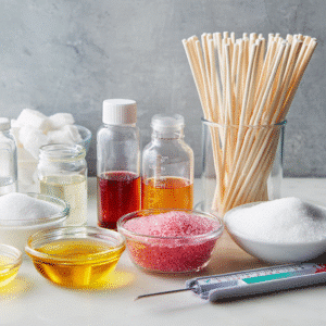 Ingredients for homemade lollipops: sugar, corn syrup, flavoring, food coloring, and lollipop sticks